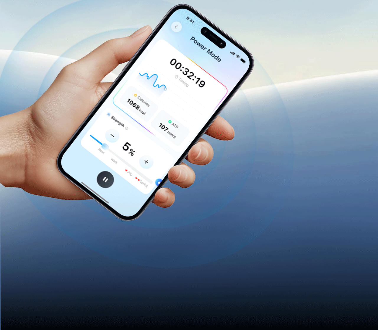 Hand holds a smartphone showing the SweetMyo Power Mode app screen with training metrics and strength controls.